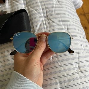 Blue reflective raybans with gold and tortoise detailing